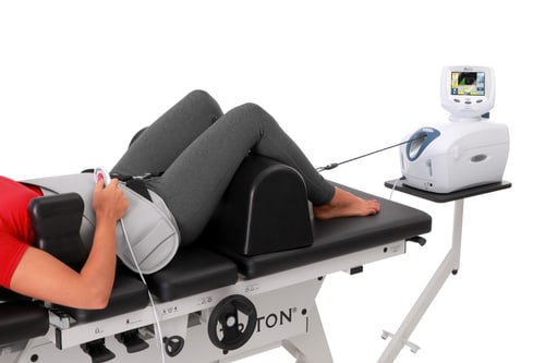 A patient receiving spinal decompression therapy
